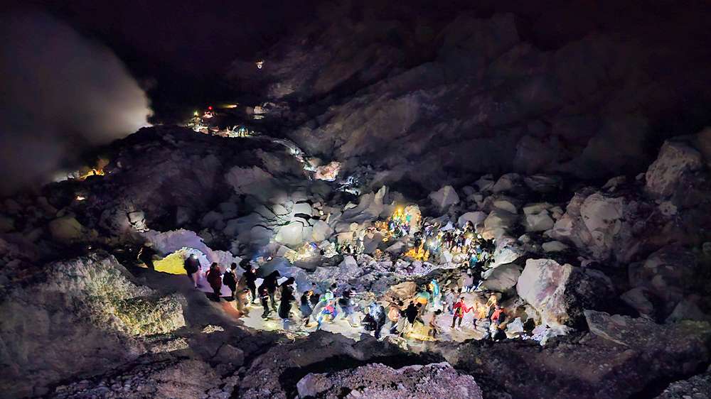 hike to ijen crater before sunrise to see the blue fire in east java