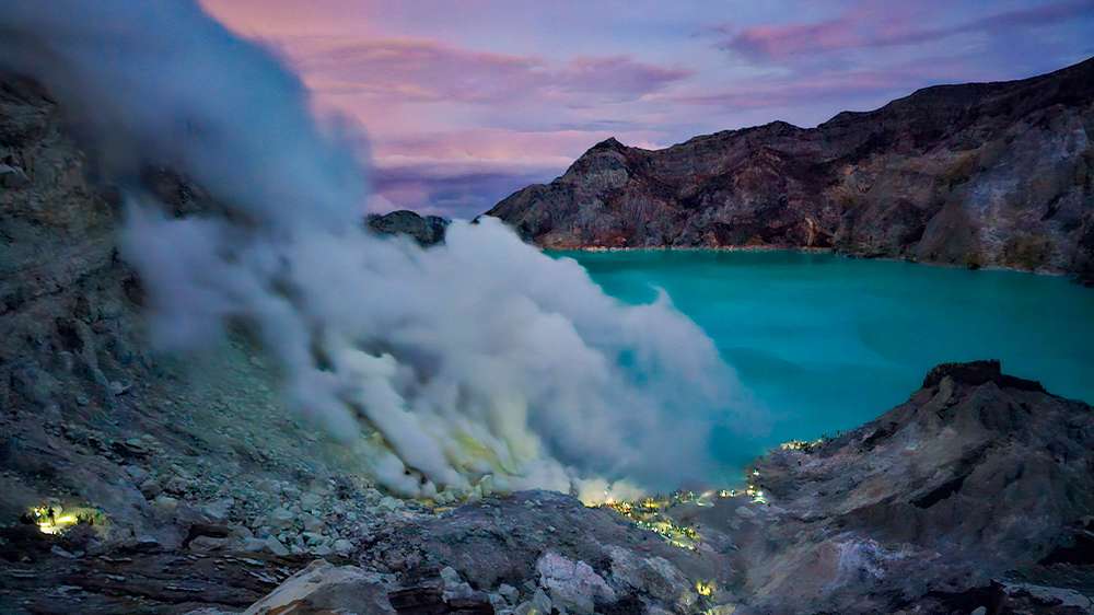 sunrise over ijen crater lake in east java