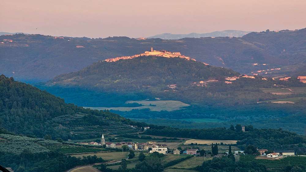 rolling hills in inland istria with cute towns