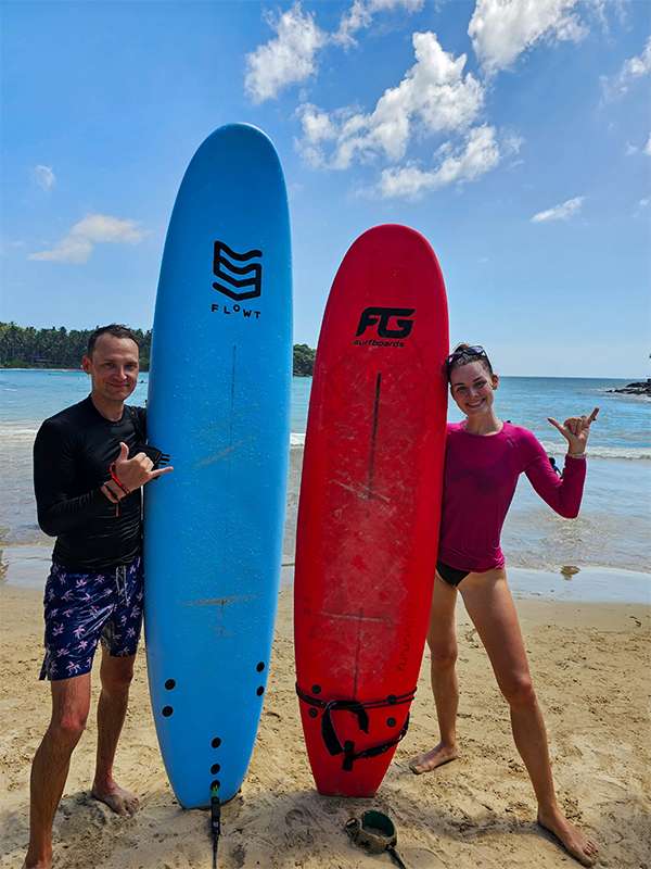surfing at hiriketiya beach, sri lanka