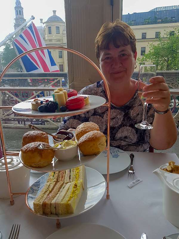 having afternoon tea with my mum at amba charing cross in london, england