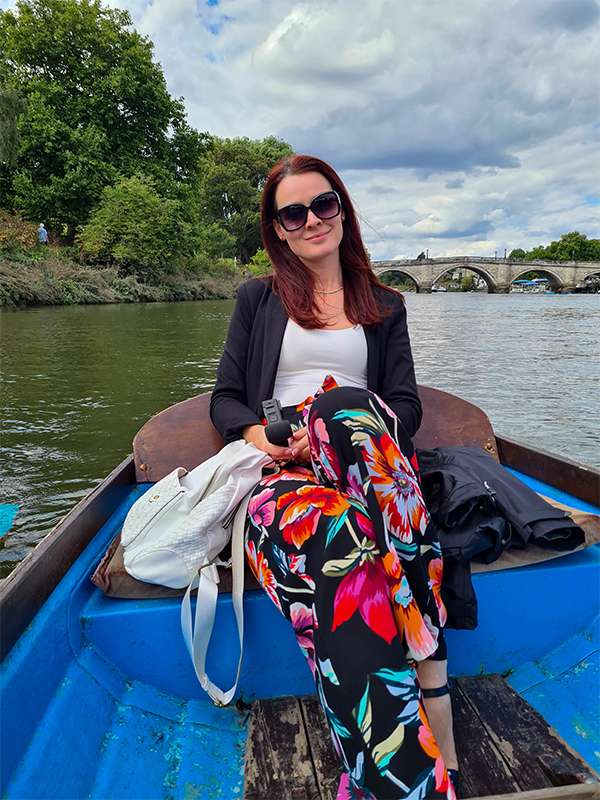 visiting london in summer time, enjoying a trip on river thames in a row boat, richmond, england
