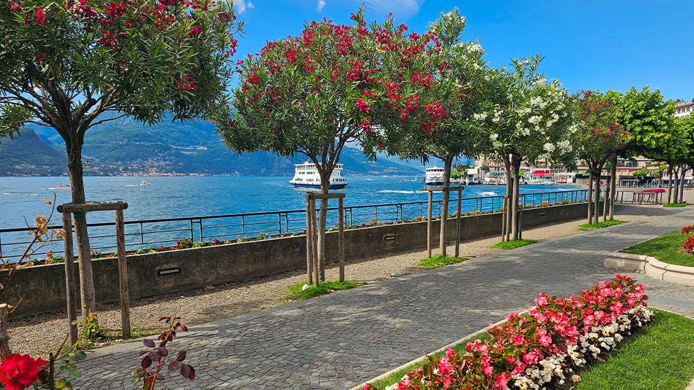 stroll along the waterfront in bellagio, lake como, italy